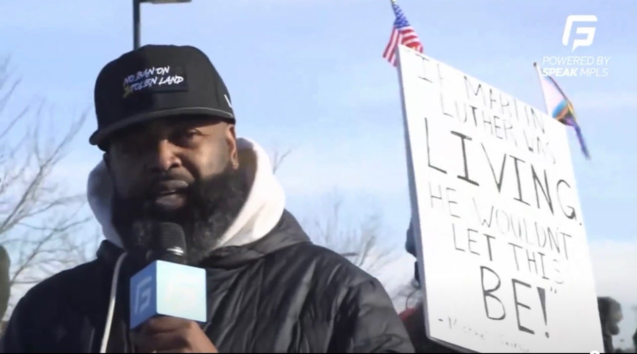 Organizer Jason Sole of Minnesota speaks to a crowd